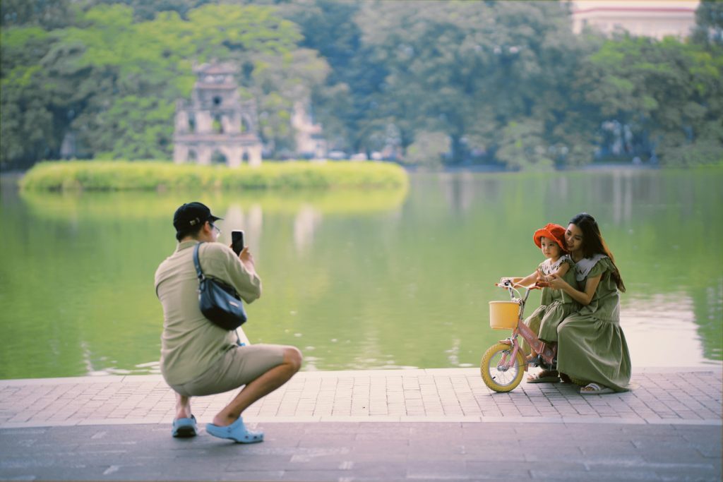 Image of a happy tourist and his family who used Emergency Vietnam Visa service offered by VietnamVisaExpress.com